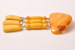 a brooch, 20.00 g., the item's dimensions (largest amberstone) 5.5 x 3.3 x 0.8 cm, amber...