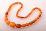 beads, amber, 61.01 g., largest stone size 2.9 x 2.3 x 2.3 cm, total length 65 cm...