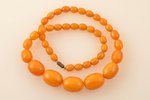 beads, largest stone dimensions 2.8 x 2.1 x 2.1 cm, bakelite, 76.10 g., lenghth 58 cm...
