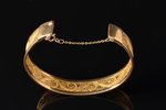 a bracelet, gold, filigree, 750 standard, 32.30 g., the diameter of the bracelet 6.6 x 5.5 cm...