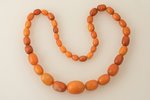 beads, amber, 49.70 g., the item's length 59 cm, largest stone size 2.6 x Ø2.05 cm...