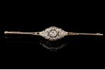 a brooch, white gold, 585 standard, 2.40 g., the item's dimensions 5.8 х 0.8 cm, diamonds, central g...