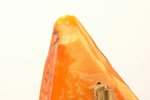 a brooch, amber, 8.1 g., the item's dimensions 3.2 x 6.2 x 0.6 cm, chip on the surface...