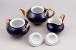 cobalt tea service: 5 tea trio, cream jug, teapot, sugar-bowl, pair of jam dishes, porcelain, M.S. K...