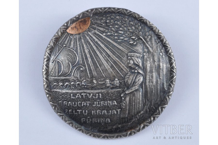 Sakta "Latvji braucat Jūriņa, zeltu krajat pūriņa", silver, 875 standard, 13.9 g., the item's dimensions 6.5 cm, the 20-30ties of 20th cent., Latvia
