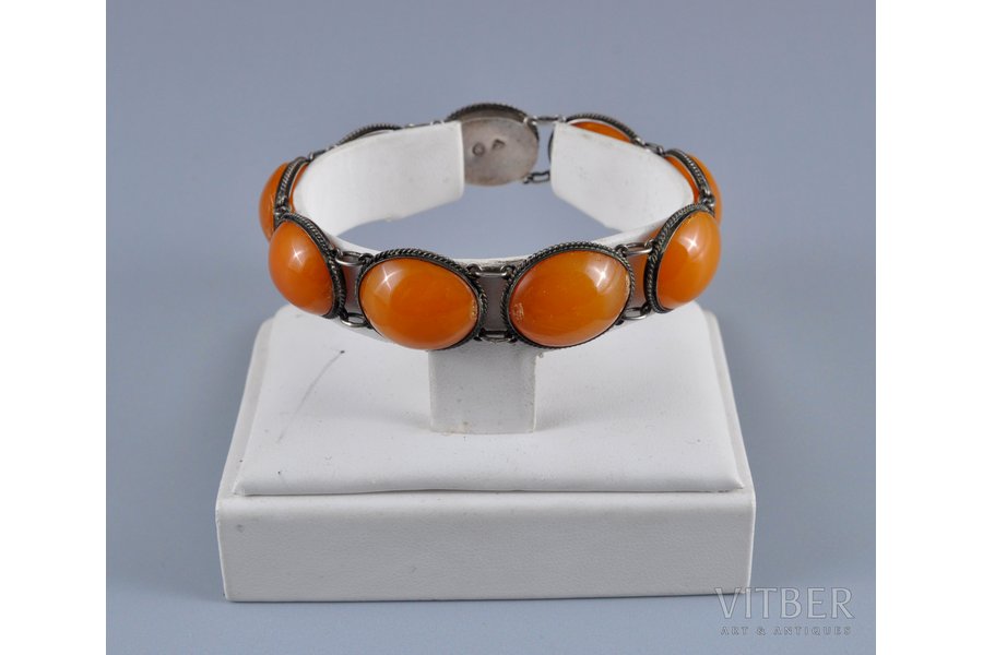 a bracelet, with amber stones, silver, 875 standard, 16.15 g., the item's dimensions 18.5 cm, the diameter of the bracelet 6 cm, the 20-30ties of 20th cent., Latvia