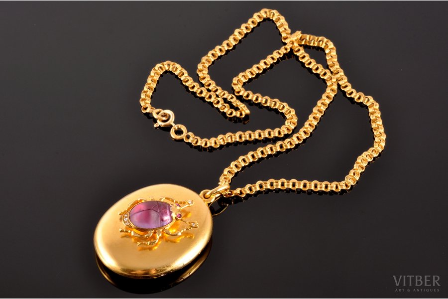 medallion with a chain, "Scarab", gold, 56 standart, (medallion) 19.80 g, (chain) 9.30 g., the item's dimensions (medallion) 4.3 x 3.1 cm, (chain) 51 cm, amethyst, brilliants, rubies, (brilliants) ~0.25 ct, the middle of the 19th cent., by Arnd Samuel, St. Petersburg, Russia
