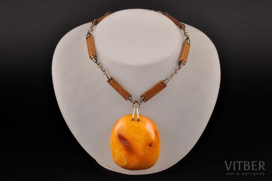 a necklace, (amber) ~30 g., the item's dimensions (amber) 5.8 x 5 x 1.7 cm, (chain) 74 cm, amber