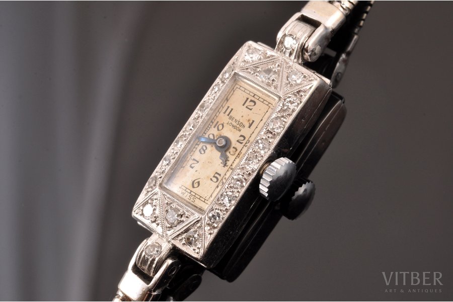 дамские наручные часы, в футляре, "Benson", Великобритания, 30-е годы 20го века, золото, бриллианты, платина, 375 проба, (общий) 18.55 г., 18-19 см, 33 x 11 мм, в рабочем состоянии