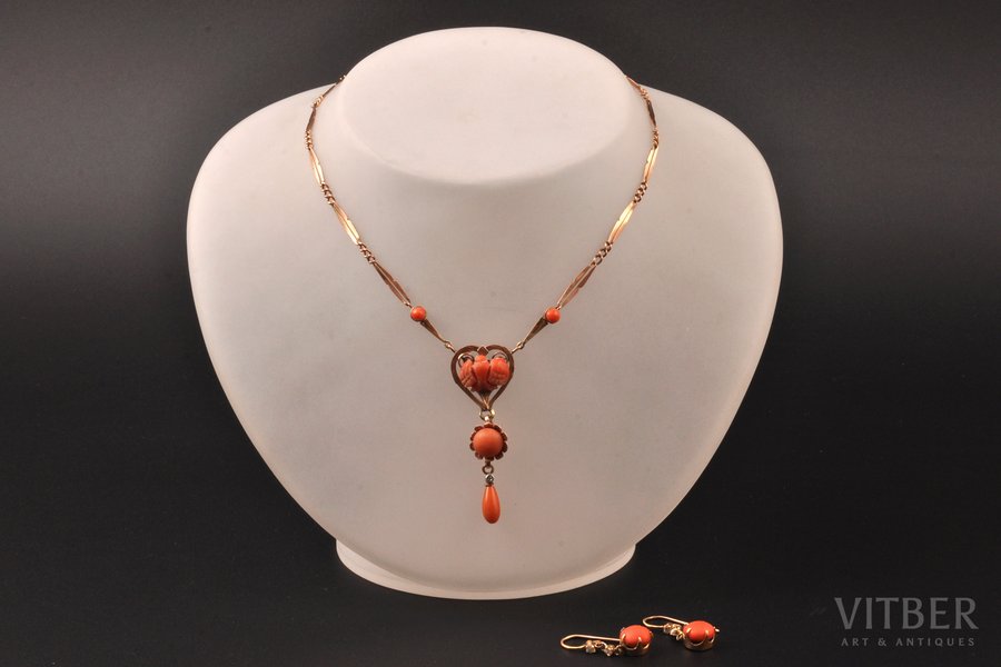 a set (earrings, necklace), gold, 2.73 + 8.40 g., the item's dimensions (necklace) 42.5 cm, Coral of Sciacca, diamonds, the border of the 19th and the 20th centuries, gold content: (necklace) 36.0 - 72.5%, (earrings) 37.5 - 75.2%; jewellery and gem identification report by Assay Office of Latvia. Over the centuries the structure of the coral fields has been modified by the volcano’s activity, and the Red Coral of the Mediterranean Sea was transformed into the unique and extraordinary Sciacca Coral, which grows in great quantity in the Sciacca area.