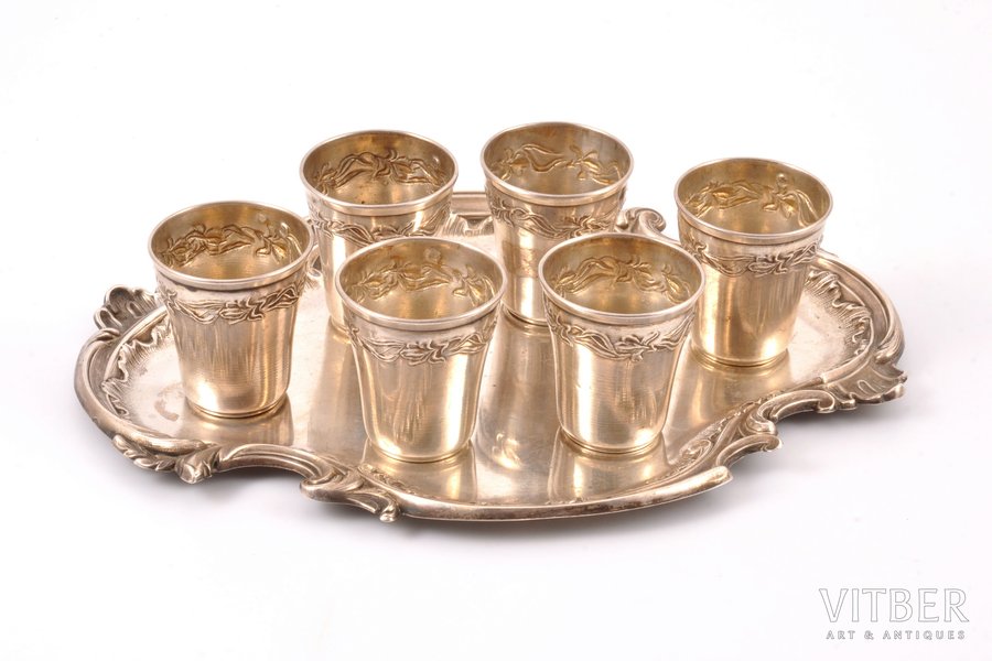 set of 6 beakers with tray, silver, 950 standard, 144.10 g, tray 18.8 x 13.6 cm, h (beaker) 3.9 cm, by Gaston Potiez, 1904-1916, France