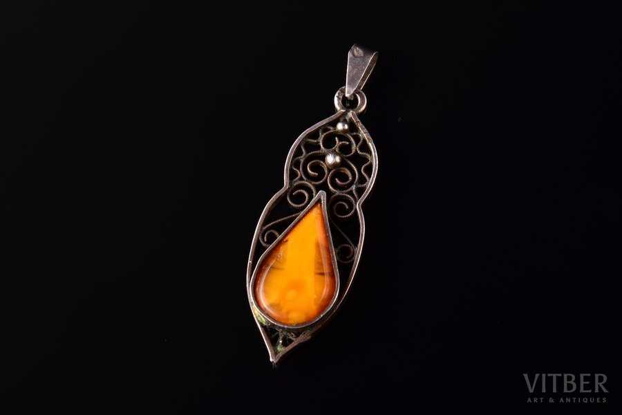 pendant with amber, silver, 875 standart, 3.20 g., the item's dimensions 4.6 x 1.5 cm, the 20-30ties of 20th cent., Latvia, amber with small chips