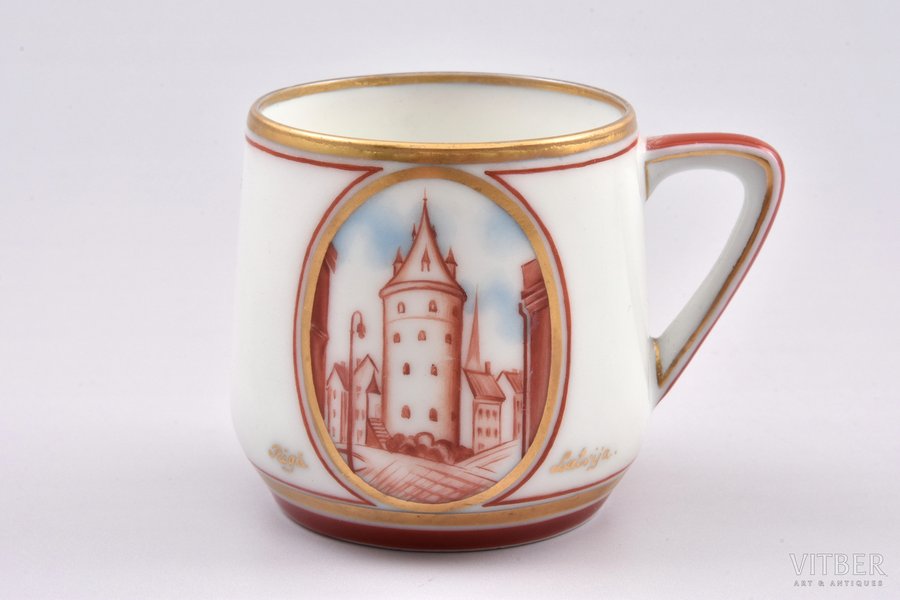 small cup, "View of the Powder Tower", porcelain, sculpture's work, M.S. Kuznetsov manufactory, handpainted by Ivan Laminsky, sketch by Vilis Vasarinsh, Riga (Latvia), 1938, 5 cm, first grade, crack professional restoration, signature of the technical director of the factory Alexey Turkov (AT) with the label "1" (meaning of the mark: single copy work in the submitted shape and painted by the sketch)