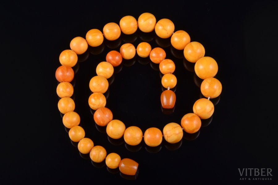 beads, amber, diameter of beads 1 - 1.6 cm, 39.92 g., necklace lenghth 44 cm, clasp made of pressed amber