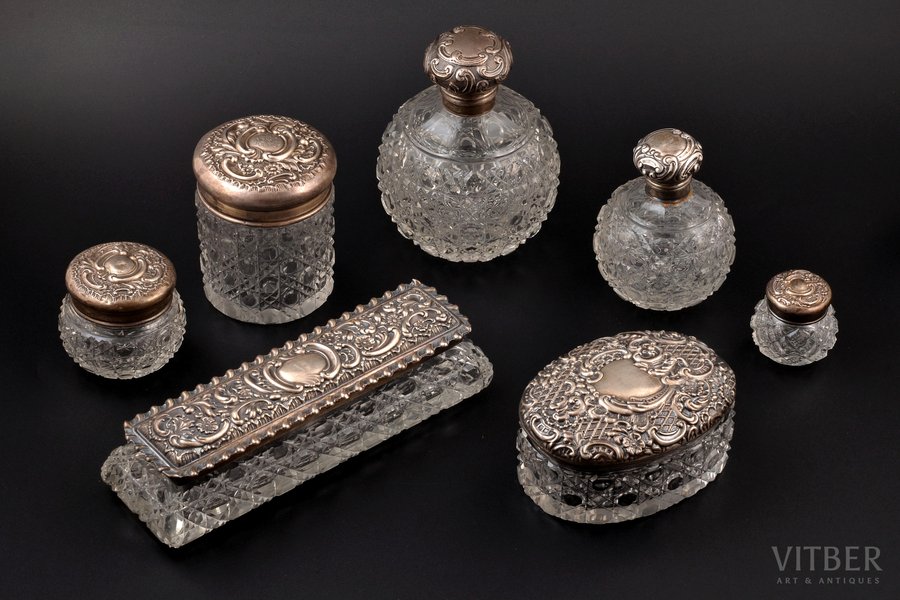 perfume set, silver, 7 items, 84 ПТ, 925 standard, total weight of silver removable lids 165.20, gilding, cut-glass (crystal), h 12.7 / 9.8 / 9.1 / 6 / 5.7 / 5.1 / 4.4 cm, 1900-1903, Birmingham, Russia, Great Britain, traces of everyday use, one jar with small chip at the bottom