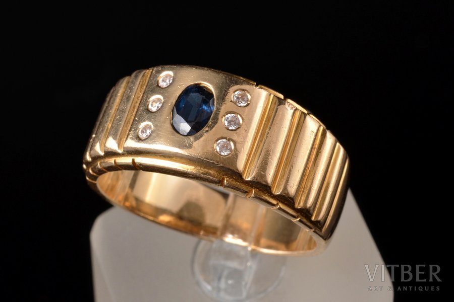 a ring, gold, 585 standard, 10.78 g., the size of the ring 20.75, diamonds, sapphire