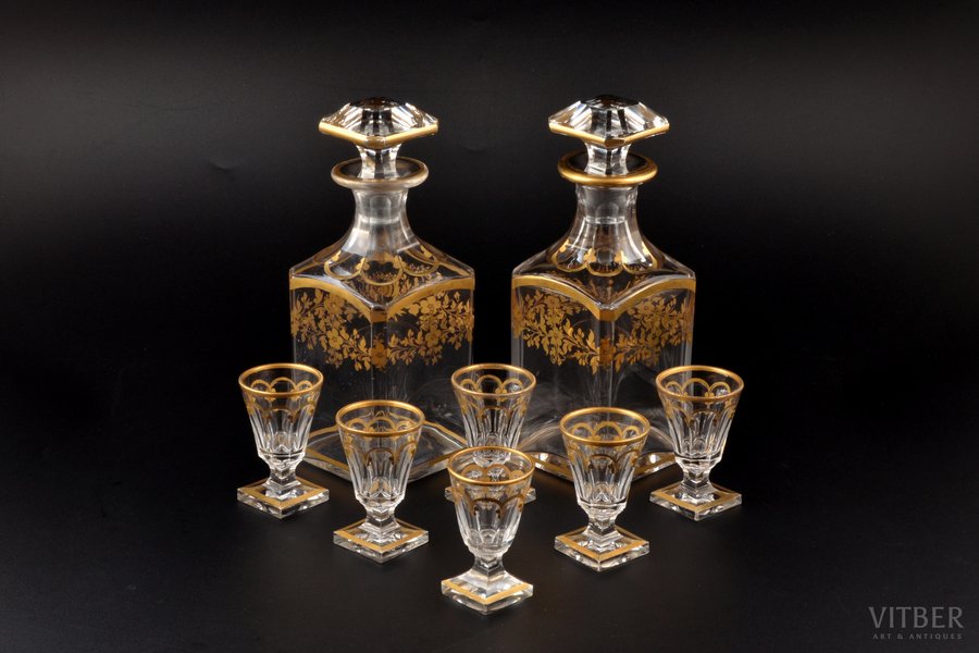 a set, 2 carafes and 6+1 small glasses, gilding, Germany(?), the border of the 19th and the 20th centuries, h (carafe with stopper) 20 cm, h (glass) 6.9 cm; traces of everyday use on the base of legs of glasses
