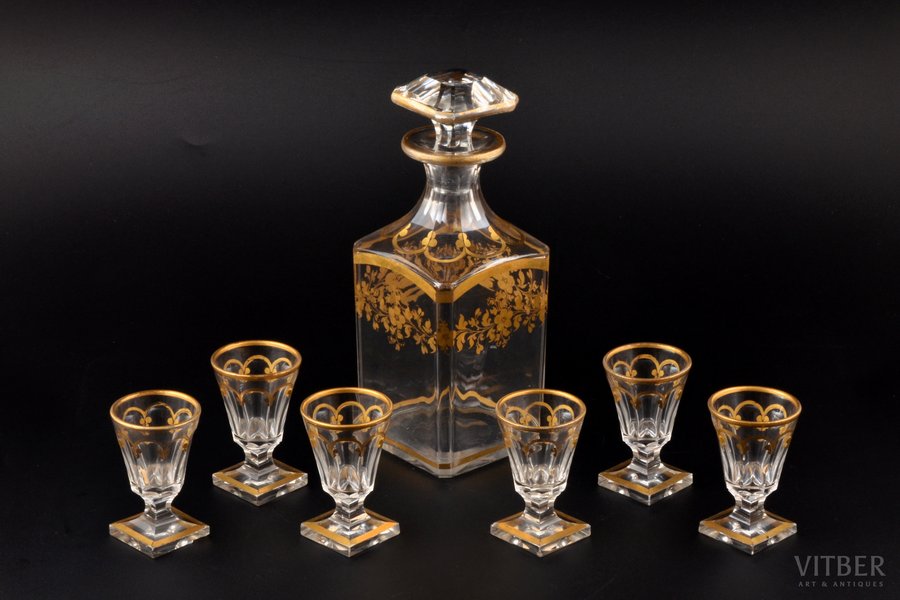 a set, carafe and 6 small glasses, gilding, Germany(?), the border of the 19th and the 20th centuries, h (carafe with stopper) 20 cm, h (glass) 6.9 cm; in some places chips on the legs of the glasses