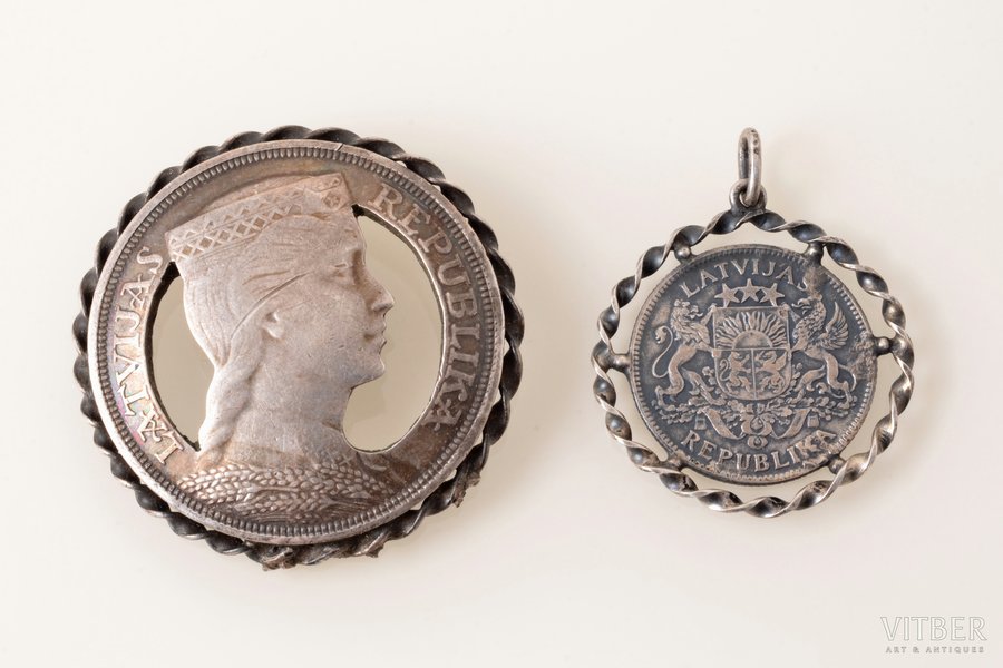 set of pendant and sakta, made of 5 lats and 1 lat coins, silver, total weight of items 30.55 g; pendant Ø 2.9 cm, sakta Ø 4.1 cm, missing pin, the 20-30ties of 20th cent., Latvia