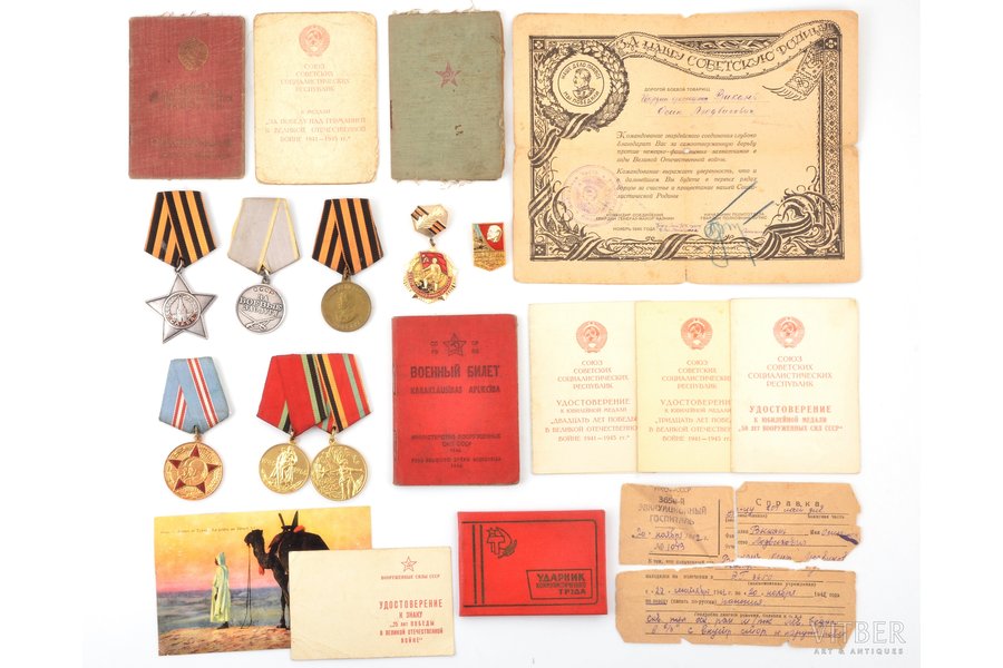 set of awards and documents, awarded to Vikon Osip Ludvigovich: Order of Glory (3rd class) No.138177 (awarded for the capture of the city of Riga), medal For Military Merit No. 976788, with certificates and documents; medal For the capture of Berlin, badge Communist Labour Record-Setter, jubilee medals etc., USSR, 1942-1976, one of the documents is torn