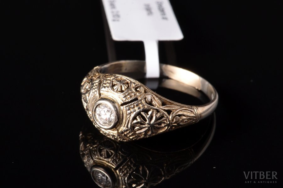 a ring, gold, 750, 18 k standard, 2.63 g., the size of the ring 18.5, diamonds, ~ 0.2 ct
