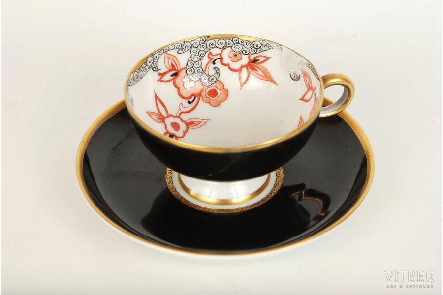 tea pair, Olga Katenyova-Neimane, handpainted, porcelain, sculpture's work, M.S. Kuznetsov manufactory, Riga (Latvia), the 30ties of 20th cent., saucer's diameter - 11.5 cm, cup's height - 4 cm, defects