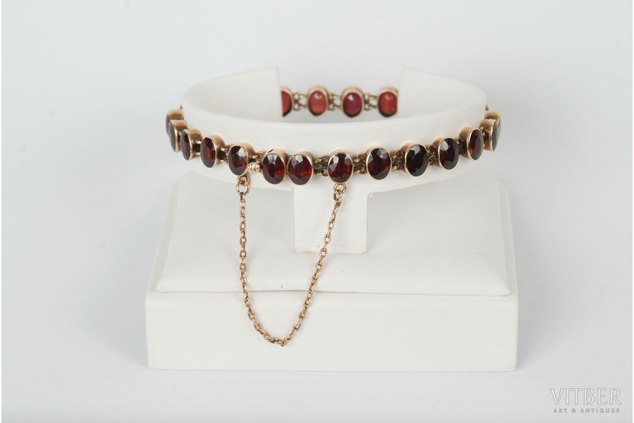 gold, 585 standard, 14.9 g., garnet, Austria-Hungary, length 18 cm, 24 stones, stone and gold's hallmark's expertise is included in the lot's price