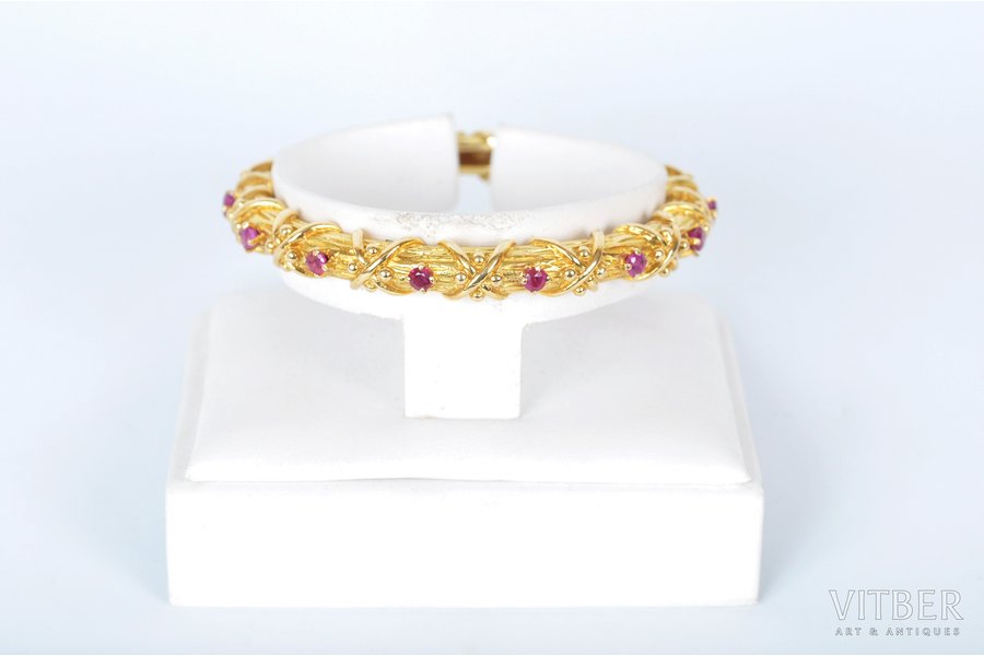 18K, gold, 45.60 g., ruby, the 40-50ies of 20 cent., internal size 5.5 cm, 14 rubies (d = ~3.4 mm)
