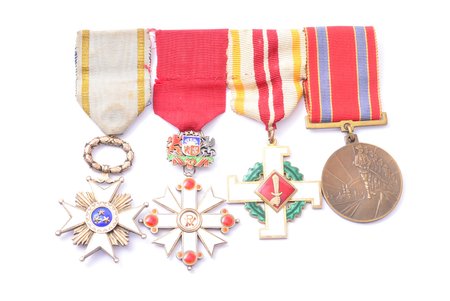 mounting bar with 4 awards. The Order of Three Stars, 5th class (60 x 38.2 mm), the Order of Vesthardus, 5th class (enamel chips, 64 x 43 mm), The Cross of Merit of Aizsargi (44.9 x 40.3 mm), the medal 10th anniversary of the Latvian Republic's fight for liberation (39.2 x 35.2 mm), Latvia, 20-30ies of 20th cent.