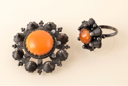 a set of ring and sakta, silver/amber, 875 standard, total weight of items 29.90 g., the size of the ring 18.25, sakta Ø 4.4 cm; the 20-30ties of 20th cent., Latvia, presumably, the USSR hallmark was applied after the 60s of the 20th century (without maker's mark)