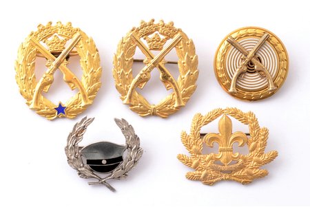 set of 5 badges: For excellent shooting, Swedish Scout Union etc., silver, 925 standard, Sweden, 20th cent.
